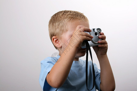 拍照玩具白色游戏手指儿童职业微笑摄影师教育儿子背景图片