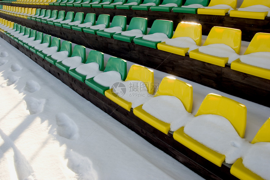 体育场和绿色椅子概念座位团队长椅游戏论坛季节闲暇黄色建筑学图片