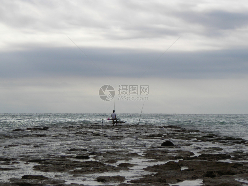 海上捕捞长椅天空渔妇灰色岩石椅子码头海滩蓝色图片