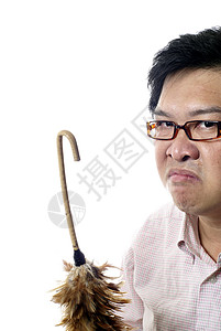 愤怒的教师 用羽毛刮青器拐杖手势男人甘蔗男性掸子教育老师情绪化背景图片