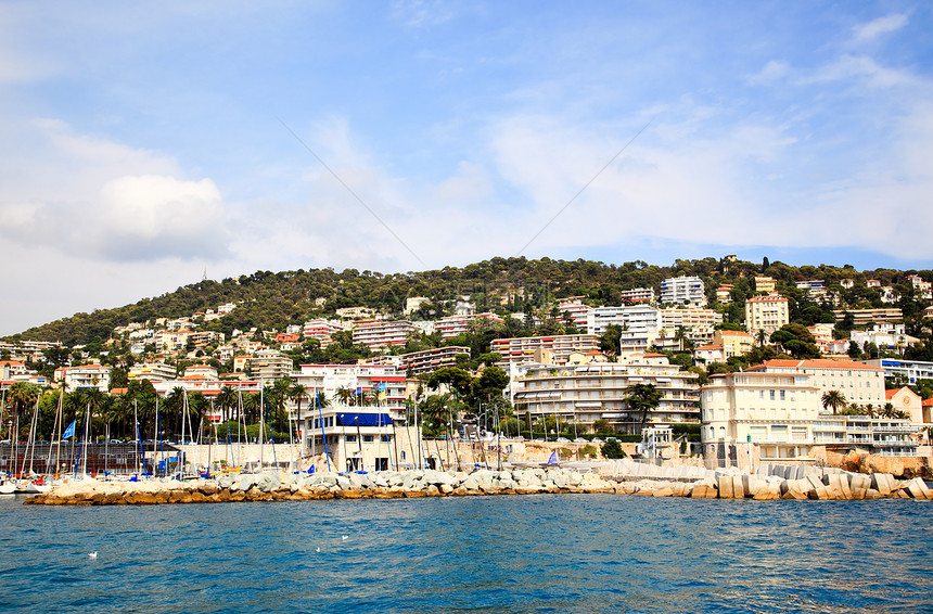 亿万富翁在尼斯海滩前线的房子旅行城市桅杆黄色假期游艇天空港口晴天图片