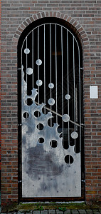 门金属装饰建筑植物砖块生活灰色保安艺术石头背景图片
