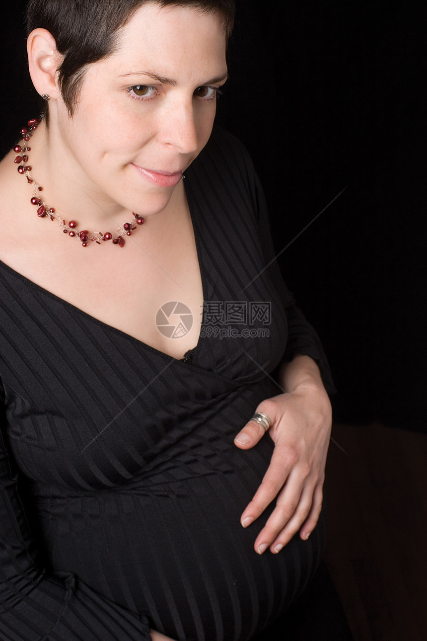孕妇木乃伊怀孕女士女性家庭腹部微笑母性妈妈母亲图片