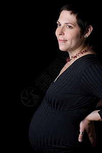 怀孕妇女状况简介微笑女性家庭女士母亲妈妈母性孩子腹部木乃伊背景图片