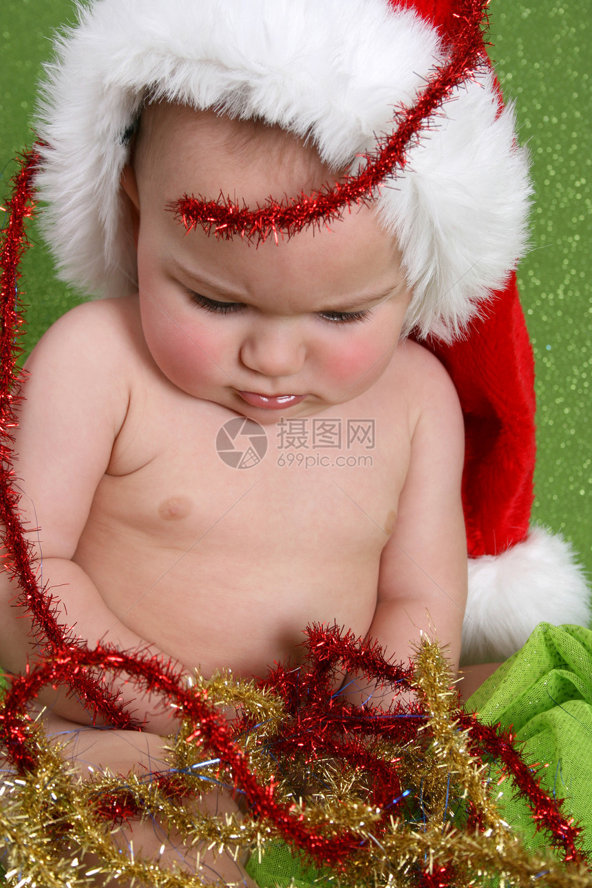 圣诞婴儿黑发专注男生绿色帽子眼睛季节性红色儿子孩子图片