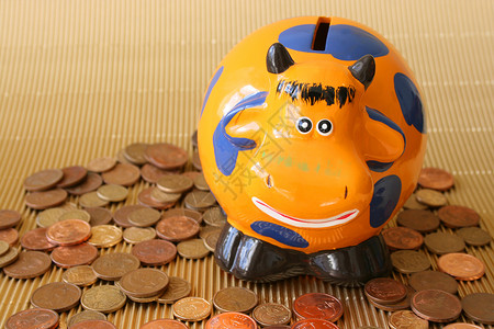 货币盒奶牛铜币硬币橙子货币教育玩具金子背景图片