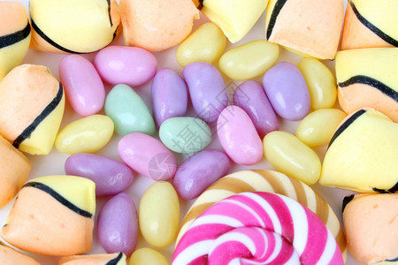 糖果糖食物黄色框架粉色橙子团体甜点紫色绿色边界背景图片