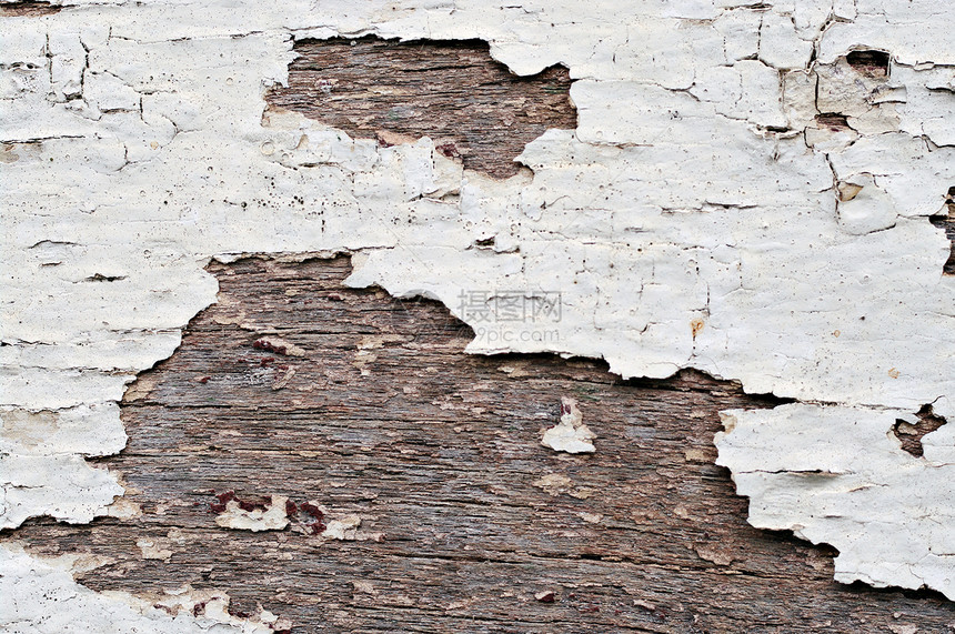 木材上的旧剥皮涂料风化栅栏图片