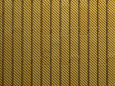 金属背景黄色床单瓦楞材料背景图片