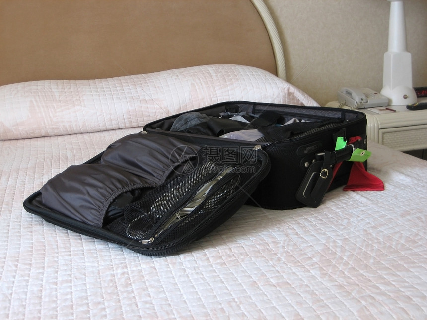 旅行者床头柜包装床单休息大床衣服汽车内饰酒店房间图片