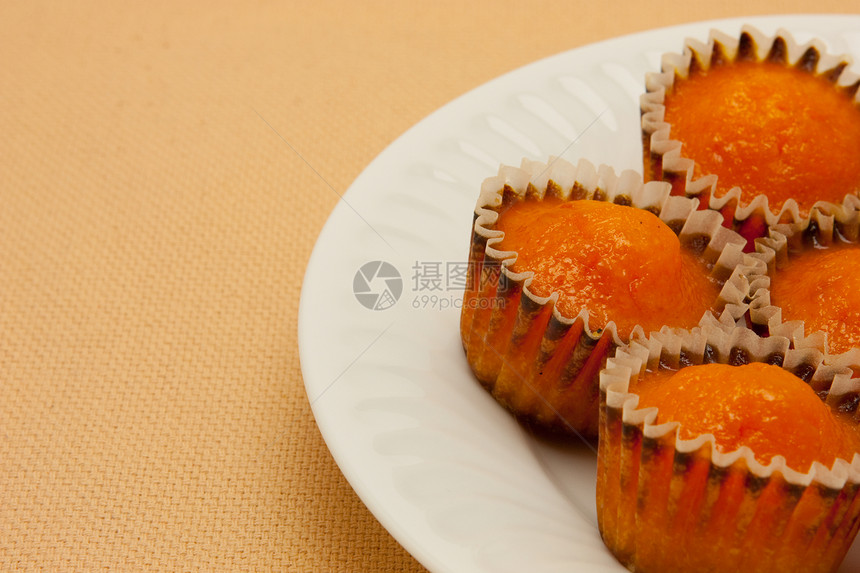 近闭橙色蛋糕奶油美食馅饼小吃甜点乐趣食物烹饪早餐白色图片