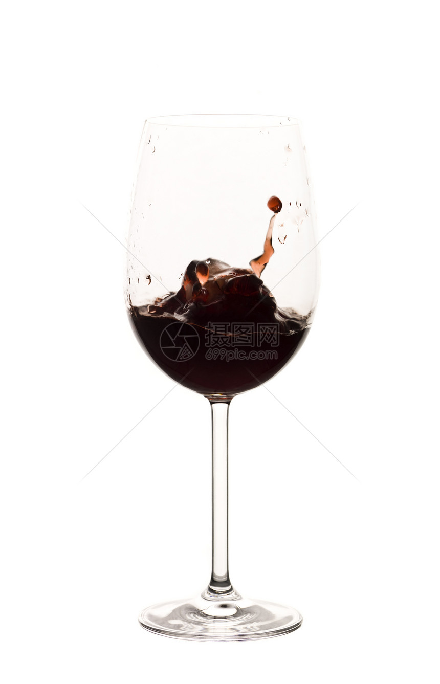 红酒在玻璃中喷洒图片