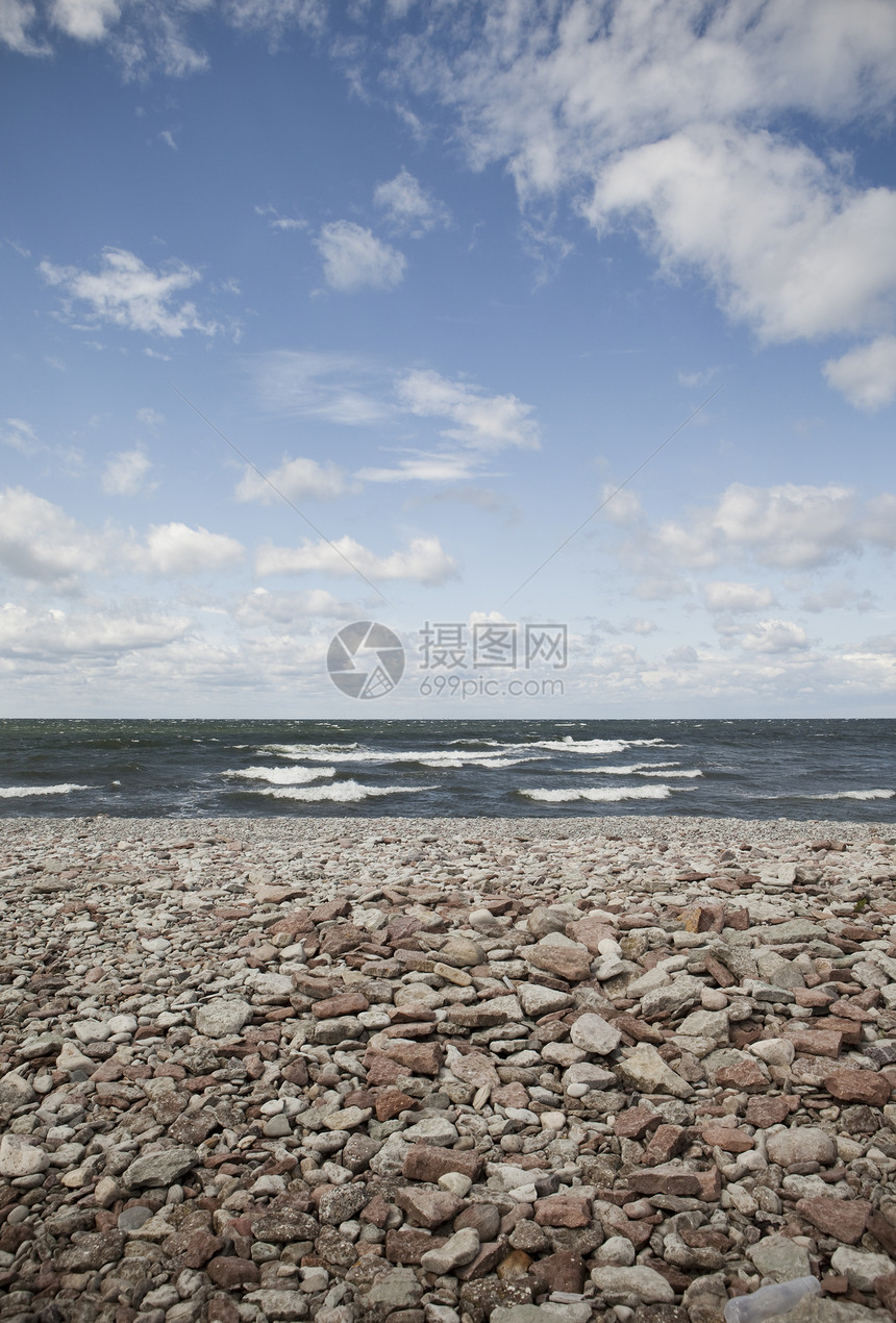 石头海滩海岸线海浪阳光平衡岩石花岗岩韧性卵石天空场景图片