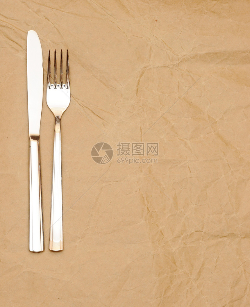 旧纸上的刀叉和刀叉午餐餐具收藏烹饪早餐金属厨房服务食物餐厅图片
