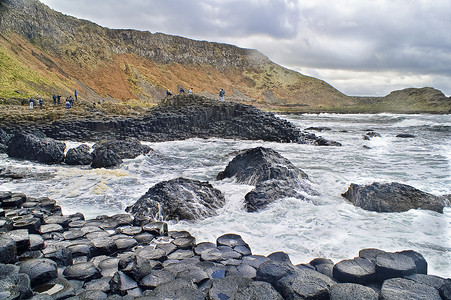 巨人高速公路在北爱尔兰的图片 笑声六边形地质学悬崖石头沿海吸引力风化场景岩石蓝色背景图片