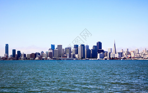 旧金山的天际丘陵商业阳光市中心建筑学地标金字塔摩天大楼旅行建筑物背景图片