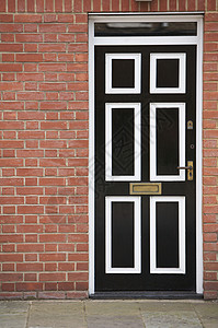 扇门黑色风格木头英语临界点砖块建筑学棕色邮政房屋高清图片