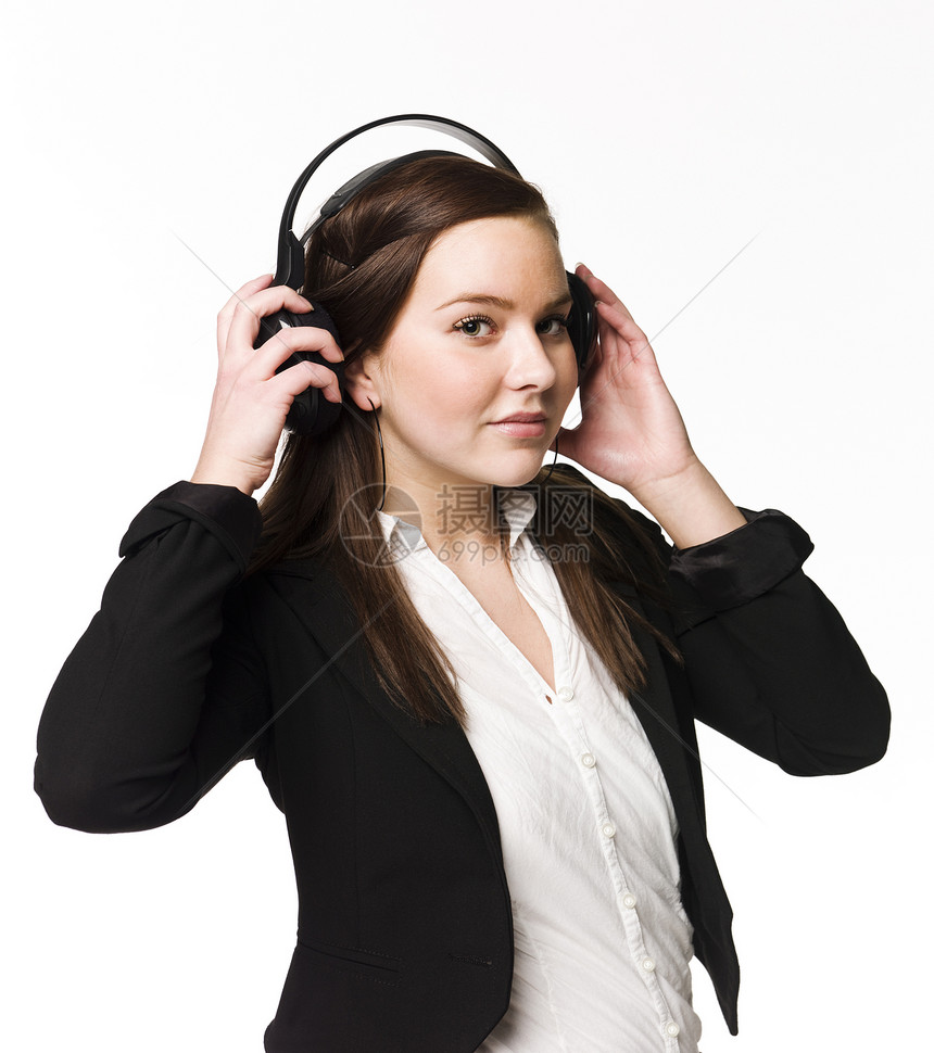女孩听音乐女士工作室音乐享受音乐播放器女性耳机白色头发棕色图片