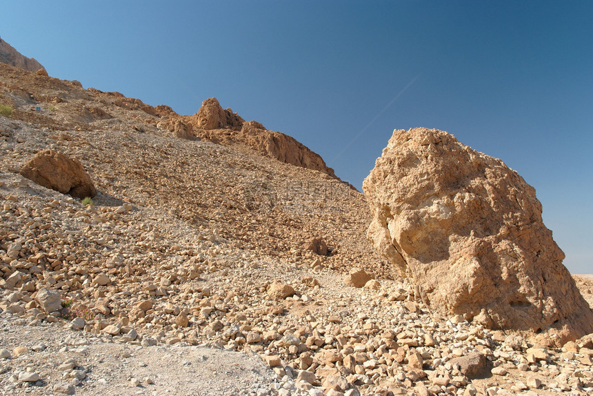 石头沙漠中的景色岩石风景干旱死海内盖夫橙子侵蚀墙壁远足鹅卵石砂岩图片