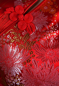 中国丝织戏服按钮传统工艺婚姻针织女士裁缝裙子服装背景图片