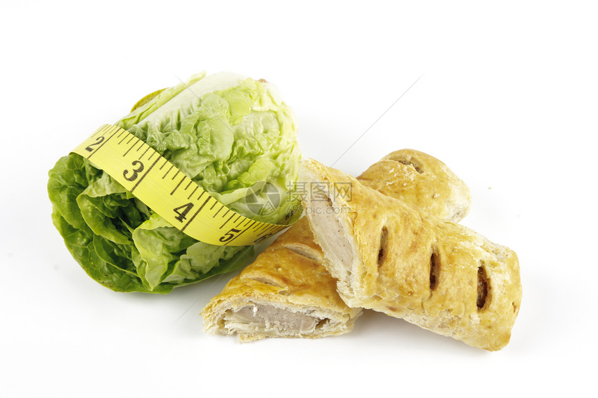 配有香菜卷和磁带测量器的萨拉德莱塔斯糕点盘子统治者猪肉测量腰围蔬菜叶子营养仪表图片