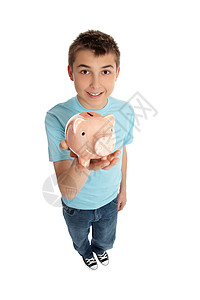 拿着粉红猪钱盒的笑男孩背景图片