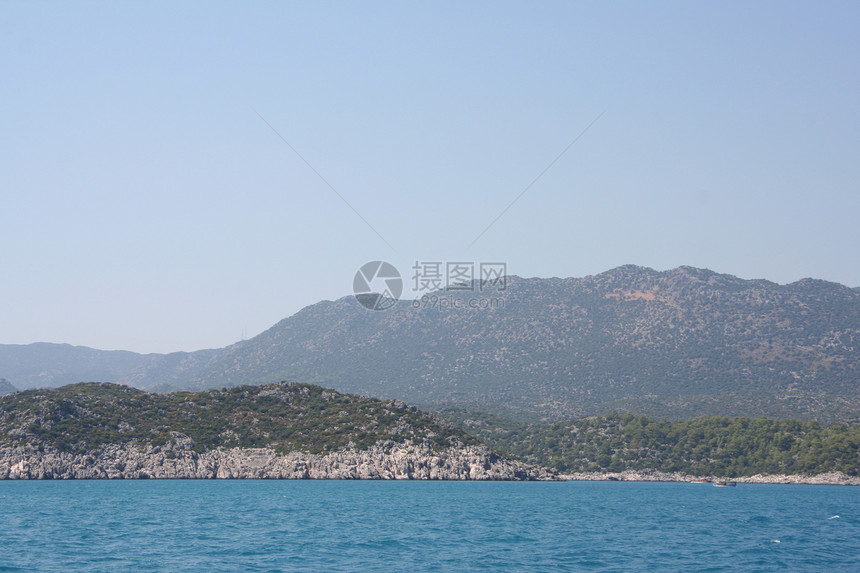地中海海岸石质快乐岩石帆船波浪游艇航行绿色旅行图片