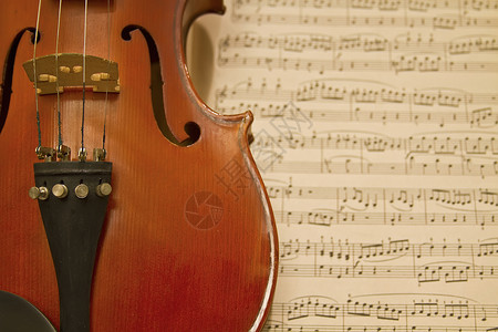 带音乐工作表的violin背景图片
