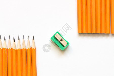 铅笔和尖锐者设计石墨黄色商业元素办公用品锐化卷笔刀概念性写作背景图片
