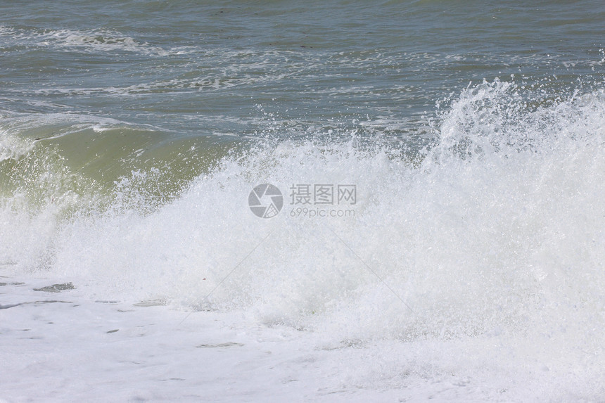 喷洒在法国诺曼底海岸滚动海浪木板海洋照片环境时间休息滚筒喷雾图片