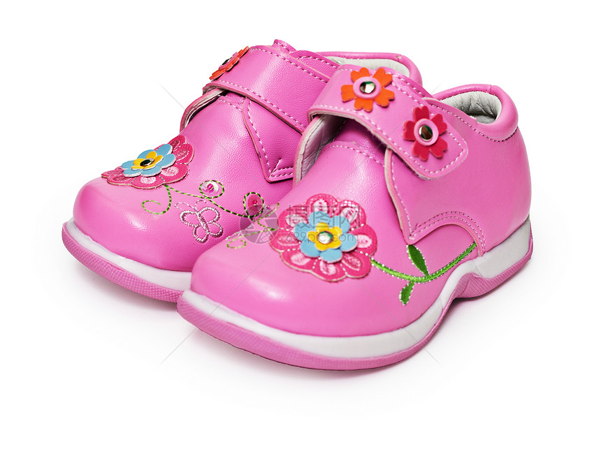 给小姑娘穿的鞋子 装饰着鲜花图片