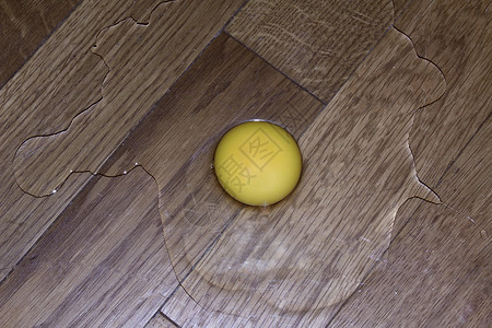 鸡蛋磁盘蛋黄地面白色木地板车轮圆圈圆形背景图片