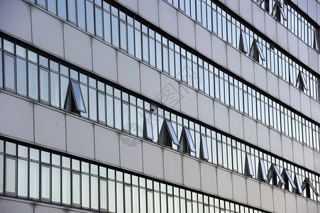 办公区块高楼平行线墙壁水平商业灰色建筑学窗户建筑玻璃背景图片