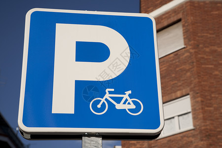 蓝色停车标志牌运输环境自行车循环背景图片