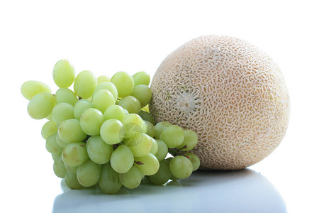 瓜和葡萄浆果绿色食物小吃甜点营养饮食圆形椭圆形背景图片