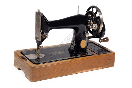 旧缝纫机工厂机器服装商针脚工人衣服维修工艺裁缝箱子高清图片