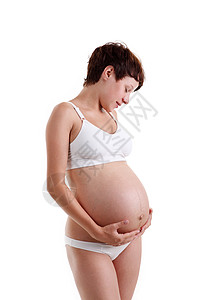 穿内衣的怀孕少女父母肚子成人女性白色幸福生活女孩女士身体背景图片