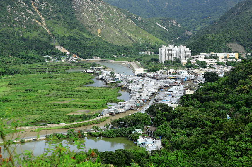 从高处看Tai O渔村蓝色住宅旅行场景木头风化棚户区村庄天空窝棚图片