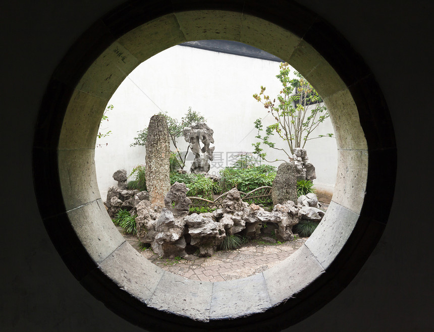中国苏州有名的齐济林花园狮子房子编队吸引力池塘植物窗户建筑物花园岩石图片