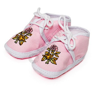 带有鲜花的婴儿粉红色靴子背景图片