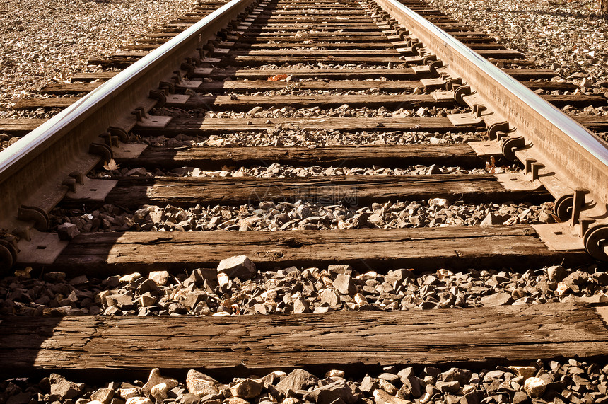 铁路铁路轨道灰色交通电源线火车石头金属旅行棕褐色碎石运输图片