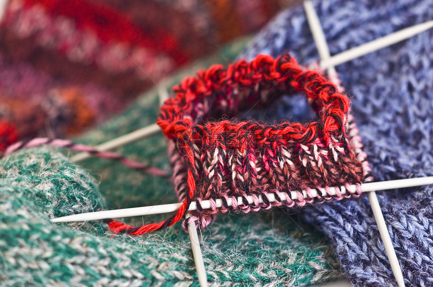 编织工艺纺织品羊毛缝纫绿色细绳针织纤维红色图片