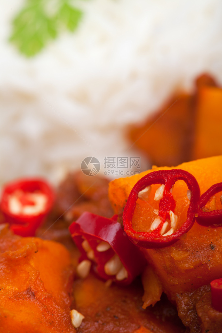 壁球咖哩的特写草本植物盘子辣椒香菜香料课程食物种子黄色壁球图片