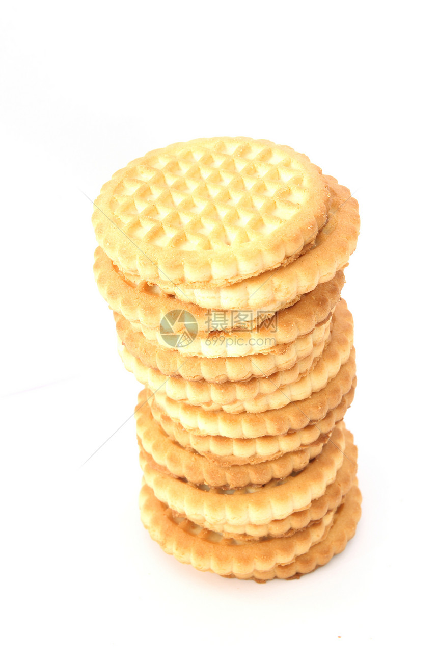 一堆短面包黄油饼干圆形棕色小吃甜点金子团体食物白色黄色圆圈图片