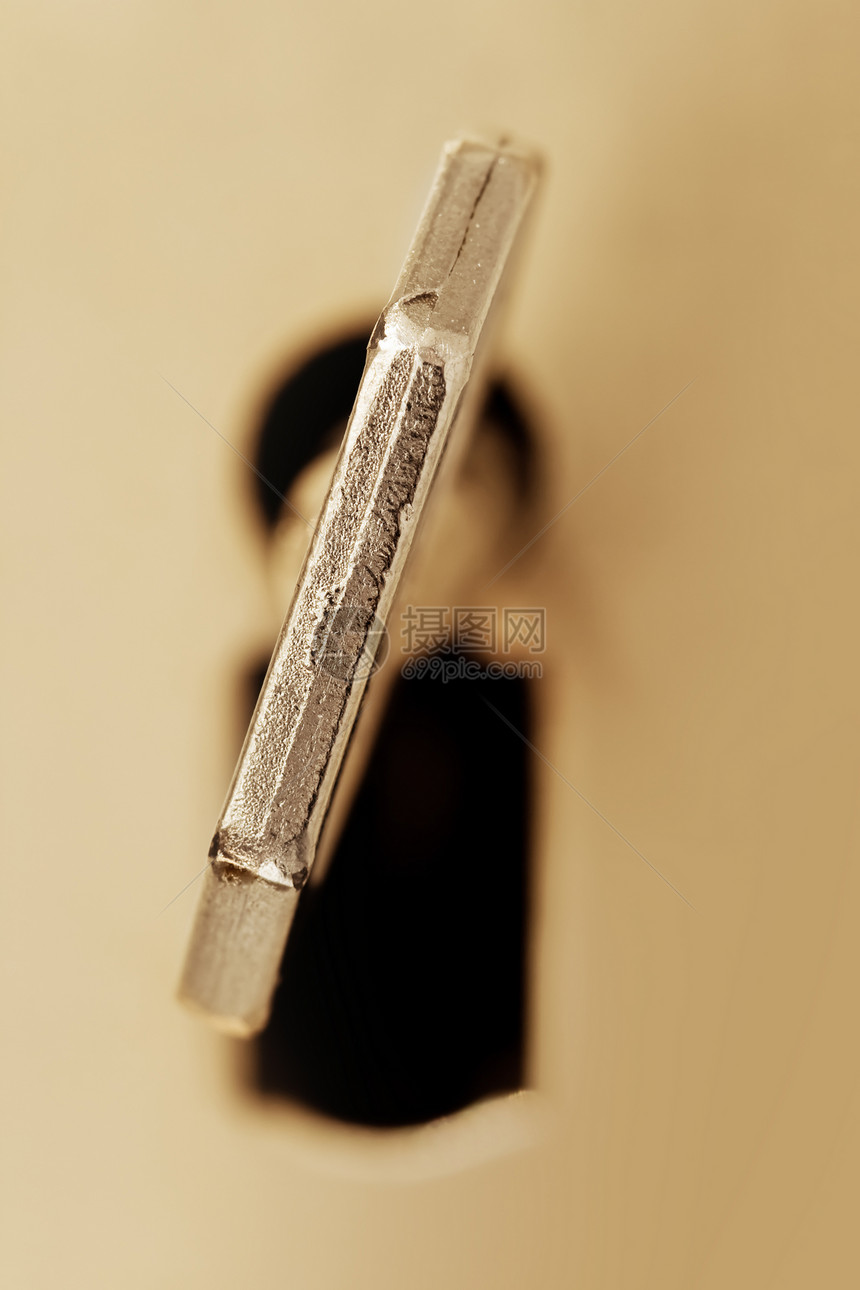 键洞中的密钥调子宏观金属概念安全建筑学钥匙建筑锁孔图片
