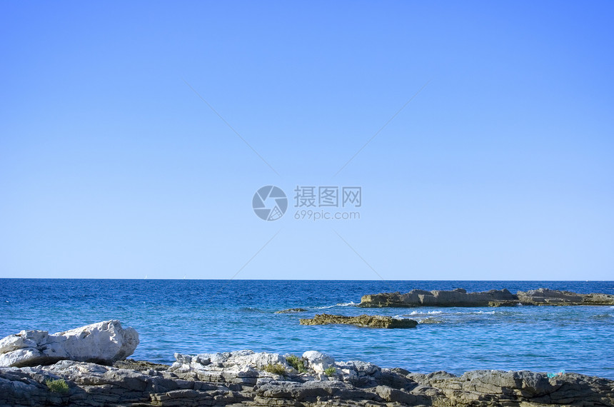 海滩岩石海岸海浪天空海洋季节地平线沿海蓝色支撑图片