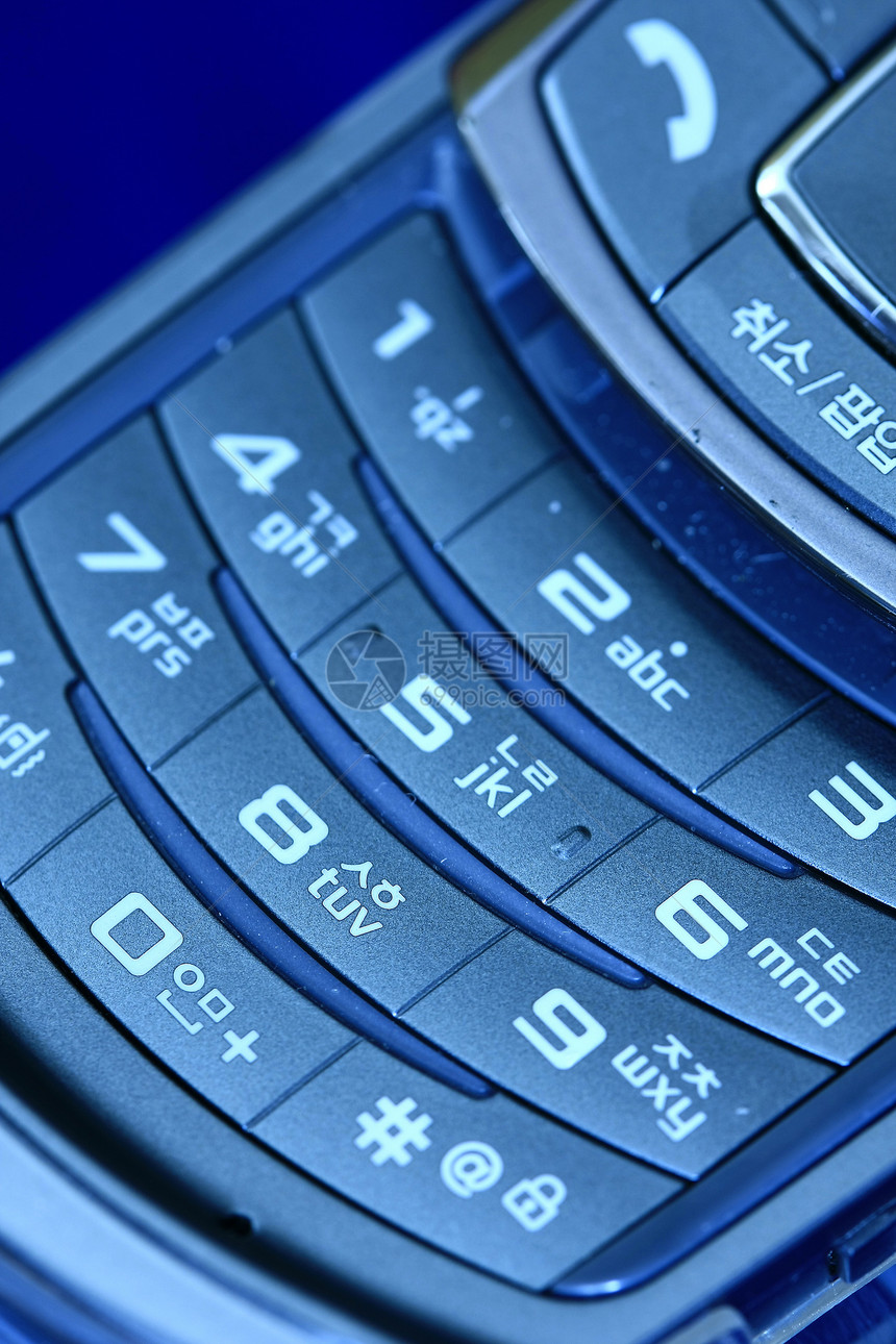移动电话钥匙电话宏观蓝色电讯键盘便利电子产品红色塑料图片