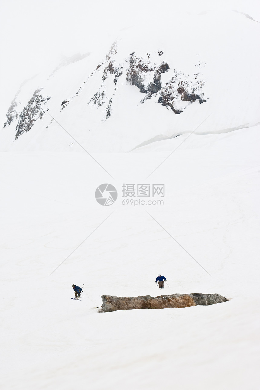 斜坡上的搭乘者乐趣雪崩自由数字野生动物白色地形孤独旅行天空图片