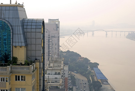 中国小城市的发展  新建筑高楼外貌城市垂直房地产商业建筑物地面经济材料背景图片