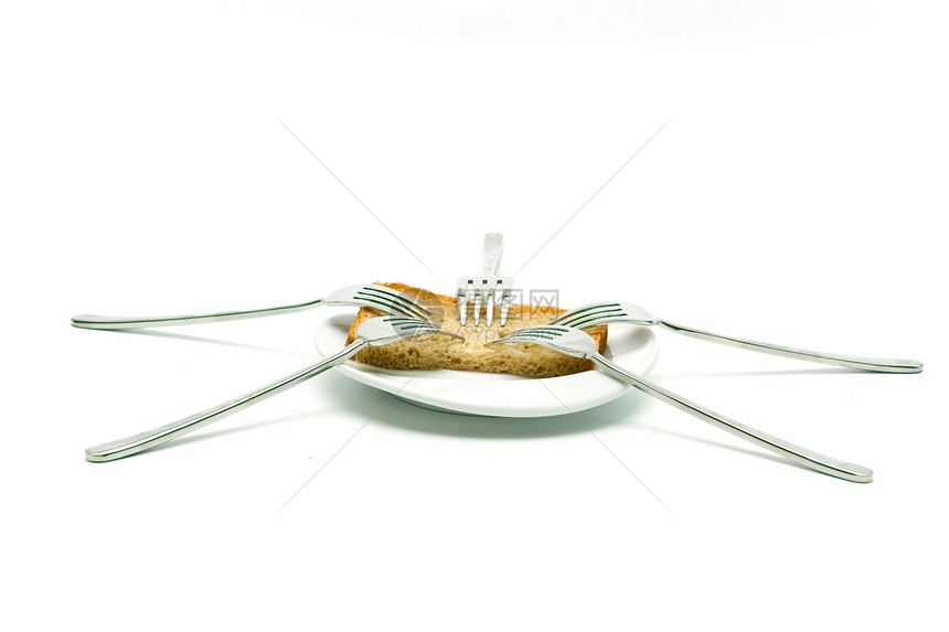 叉子和面包桌子小吃食物用餐粮食早餐盘子白色餐具烘烤图片